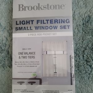 Brand new! Brookstone light filter curtain